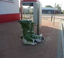 Dinosaur feet garbage bin